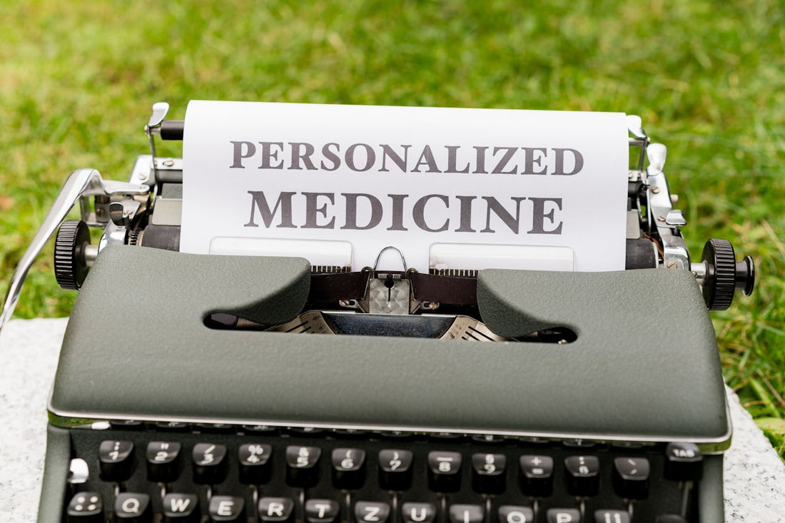 a typewriter with a paper that reads personalized medicine