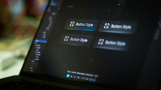 Laptop screen displays four button style options