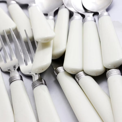 Gibson Sensations II 16 Piece Stainless Steel Flatware Set with White Handles and Chrome Caddy