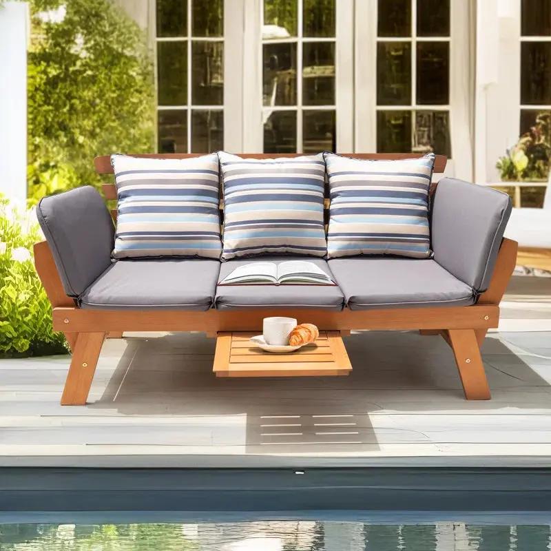 Chill in Style! 🌿✨ Meet the Katinka Eucalyptus Outdoor Daybed Sofa – complete with comfy pillows, a folding armrest, and a handy coffee tray! Perfect for your backyard oasis! ☕🌞