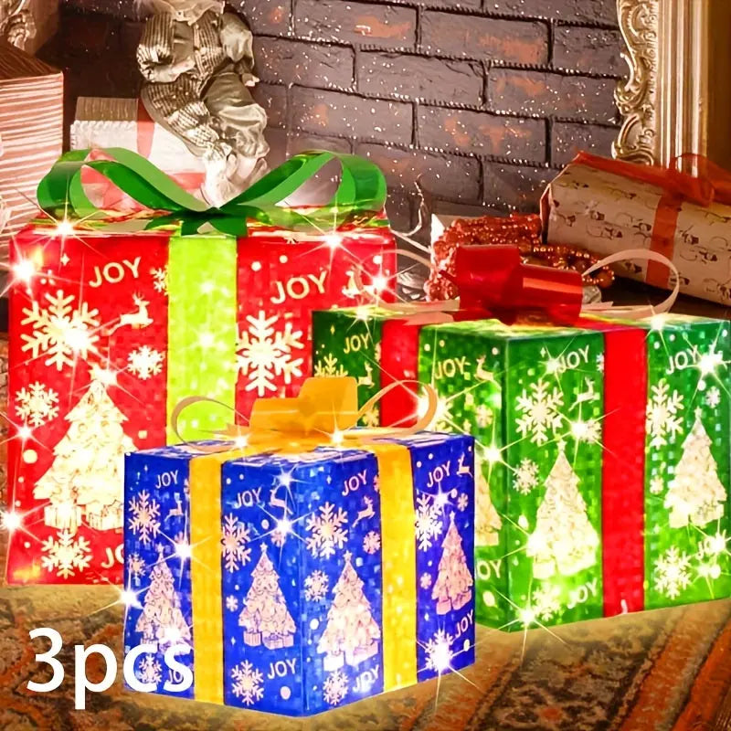 3 Christmas lighted gift boxes in red, green and blue color Our3Designs
