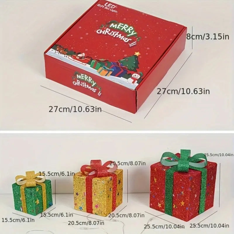 3 Christmas lighted gift boxes in red, green and blue color Our3Designs