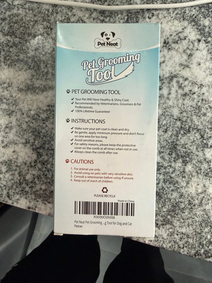 Pet grooming brush