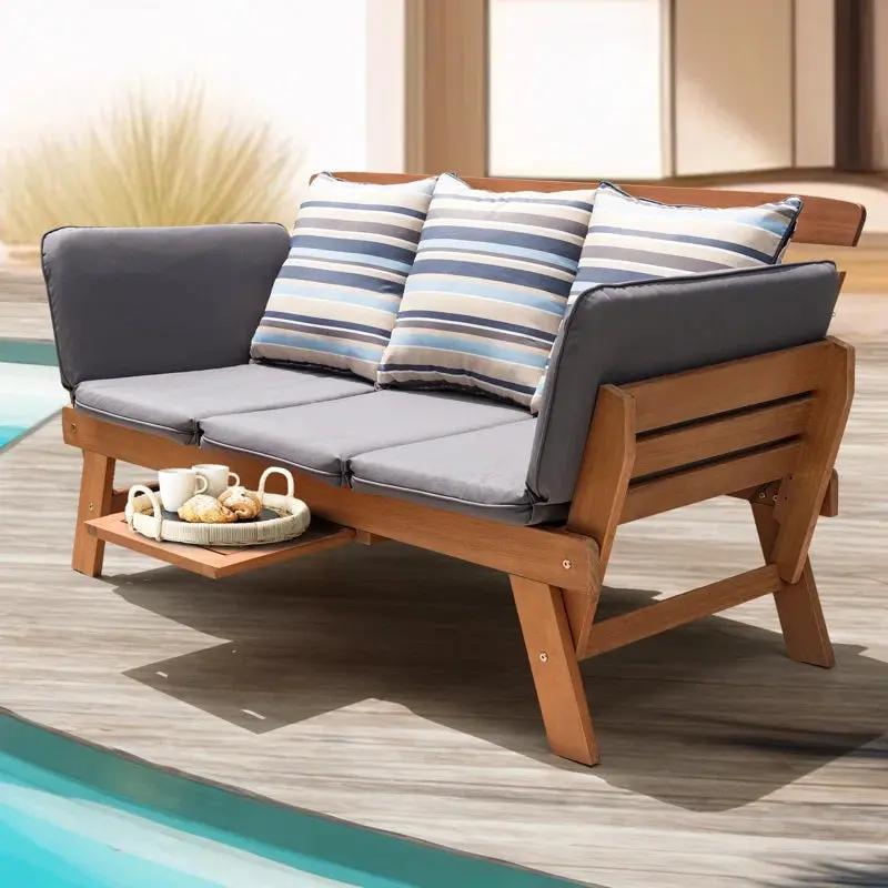 Chill in Style! 🌿✨ Meet the Katinka Eucalyptus Outdoor Daybed Sofa – complete with comfy pillows, a folding armrest, and a handy coffee tray! Perfect for your backyard oasis! ☕🌞