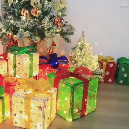 3 Christmas lighted gift boxes in red, green and blue color